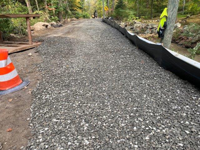 crushed stone area at Farms Rd